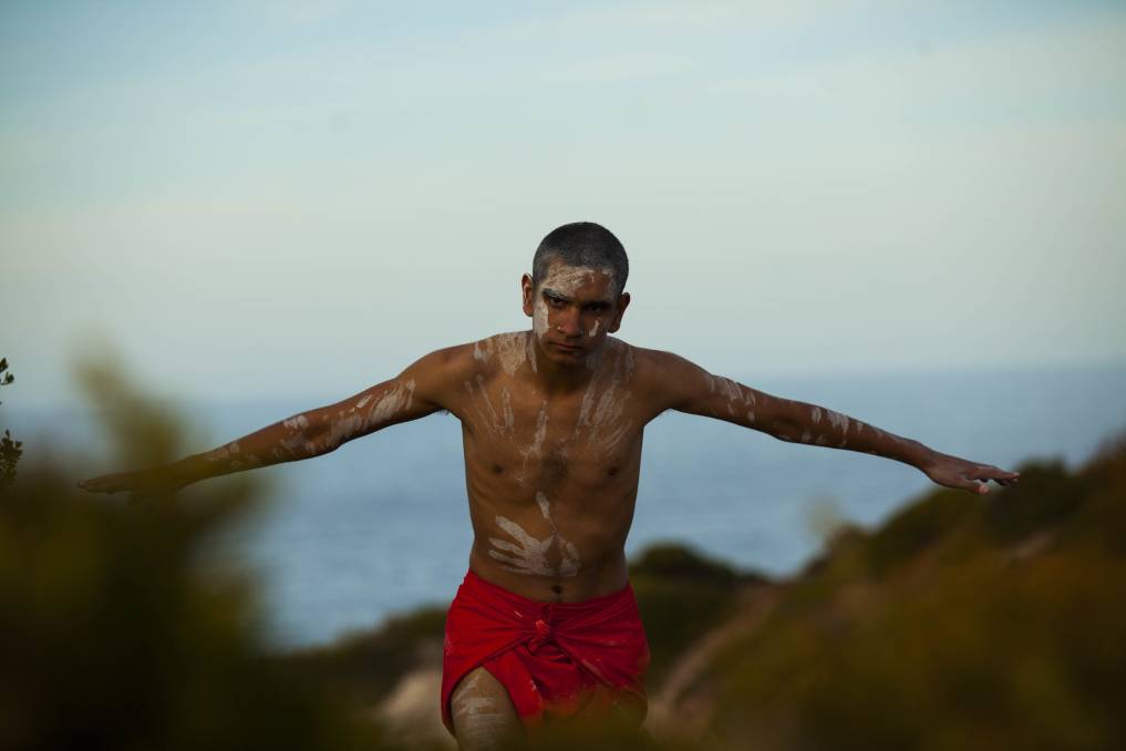 Aboriginal man in traditional clothing and body painting