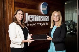 Jemena donating a laptop to Campbell Page