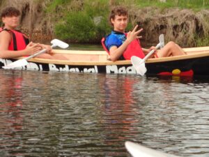 Two teenagers canoeing